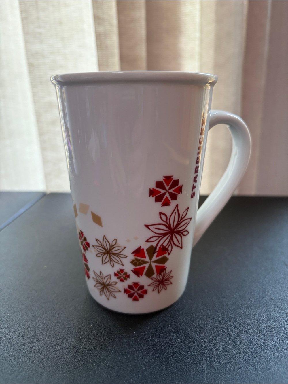 Starbucks White Ceramic Mug with Red and Gold Floral Motif